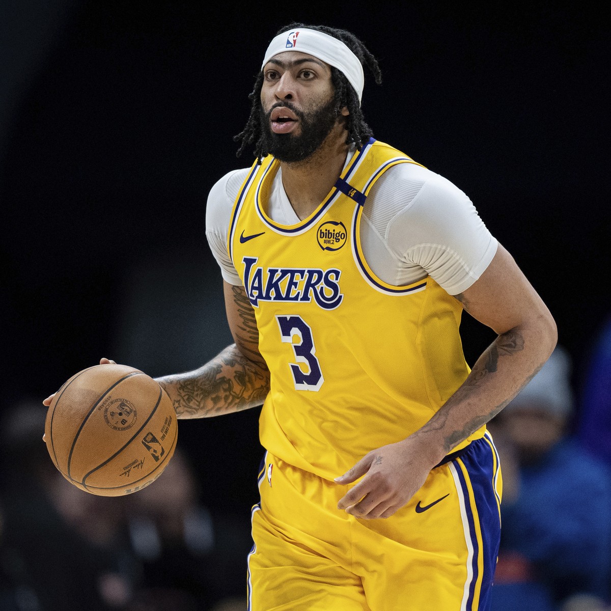 Los Angeles Lakers forward Anthony Davis brings the ball upcourt during the second half of an NBA basketball game against the Charlotte Hornets, Monday, Jan. 27, 2025, in Charlotte, N.C. (AP Photo/Jac ...