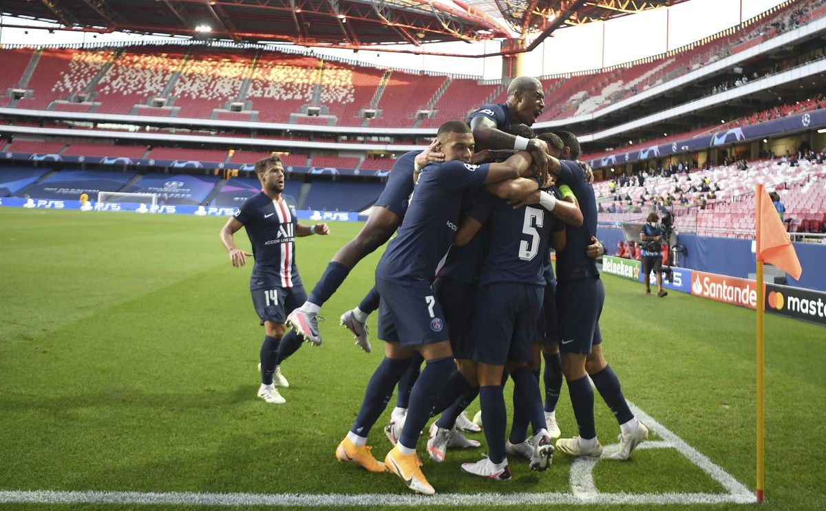 PSG's players celebrate after Marquinhos scored his side's first goal during the Champions League semifinal soccer match between RB Leipzig and Paris Saint-Germain at the Luz stadium in Lisb ...