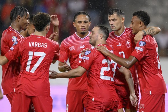 Switzerland&#039;s midfielder Xherdan Shaqiri, 3rd right, celebrates his goal with his teammates Switzerland&#039;s defender Manuel Akanji, left, Switzerland&#039;s midfielder Ruben Vargas, 2nd left,  ...