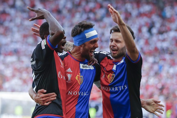 Basel&#039;s Adama Traore of Ivory Coast, Matias Delgado of Argentina, and Renato Steffen, from left, celebrate after Traore&#039;s goal to 2:0 during the Swiss Cup final soccer match between FC Basel ...