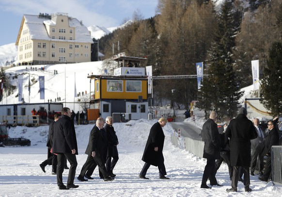 US President Donald Trump, center, arrives in Davos, Switzerland on Marine One, Tuesday, Jan. 21, 2020. President Trump arrived in Switzerland on Tuesday to start a two-day visit to the World Economic ...