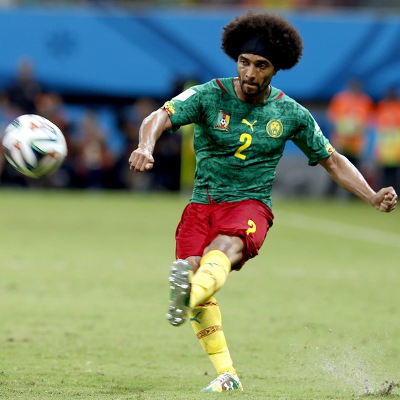 epa04265904 Benoit Assou-Ekotto of Cameroon in action during the FIFA World Cup 2014 group A preliminary round match between Cameroon and Croatia at the Arena Amazonia in Manaus, Brazil, 18 June 2014. ...