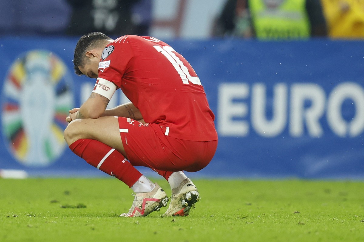 Switzerland's disappointed captain Granit Xhaka after the UEFA Euro 2024 qualifying group I soccer match between Romania and Switzerland at the National Arena stadium in Bucharest, Romania, Tuesd ...