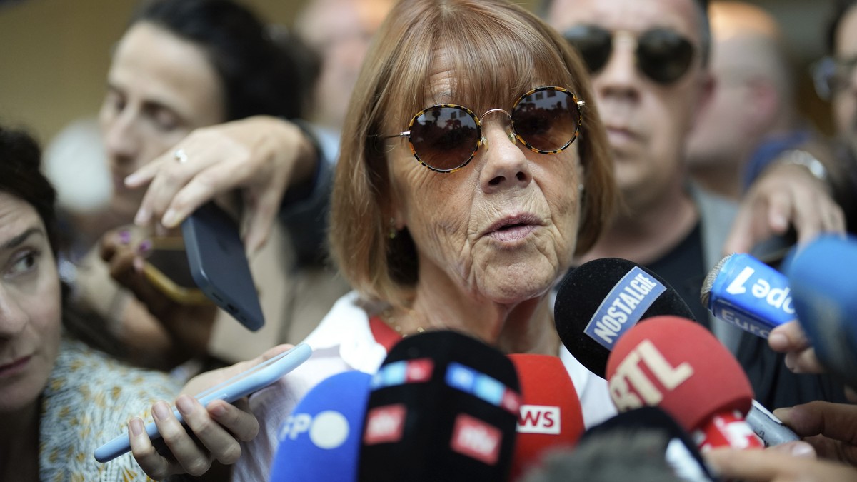 Gisele Pelicot speaks to media as she leaves the Avignon court house, southern France, Thursday, Sept. 5, 2024. A woman allegedly drugged by her ex-husband so that she could be raped by other men whil ...