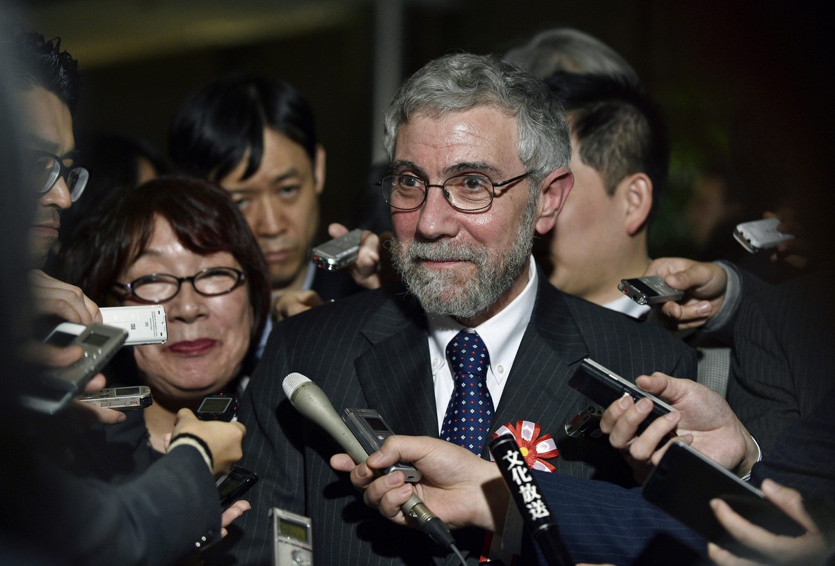 epa05225318 US economist and Nobel Prize winner Paul Krugman reacts to questions from journalists after his meeting with Japanese Prime Minister Shinzo Abe at Abe's official residence in Tokyo, J ...