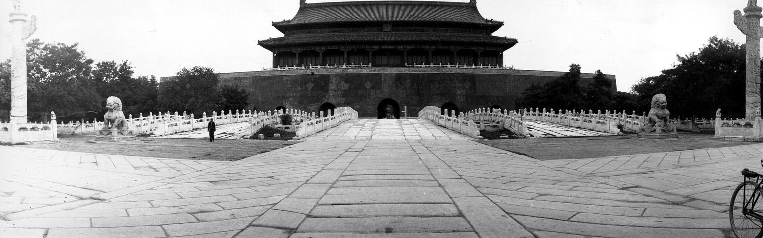 Two stone lions guard one of the numerous entrances to the Forbidden City, a walled complex for the imperial palace during the Ming and Qing dynasties, in Peking, China, on June 17, 1935. (AP Photo)