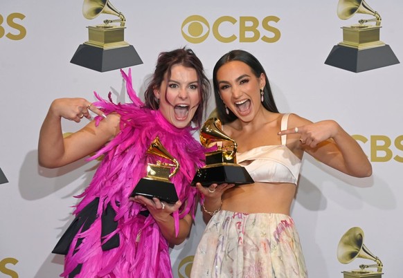 LAS VEGAS, NEVADA - APRIL 03: (L-R) Abigail Barlow and Emily Bear pose in the winners photo room during the 64th Annual GRAMMY Awards at MGM Grand Garden Arena on April 03, 2022 in Las Vegas, Nevada.  ...