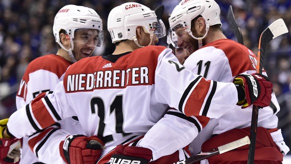 Carolina Hurricanes center Jordan Staal (11) celebrates his goal against Toronto Maple Leafs goaltender Garret Sparks with teammates during the third period of an NHL hockey game, Tuesday, April 2, 20 ...