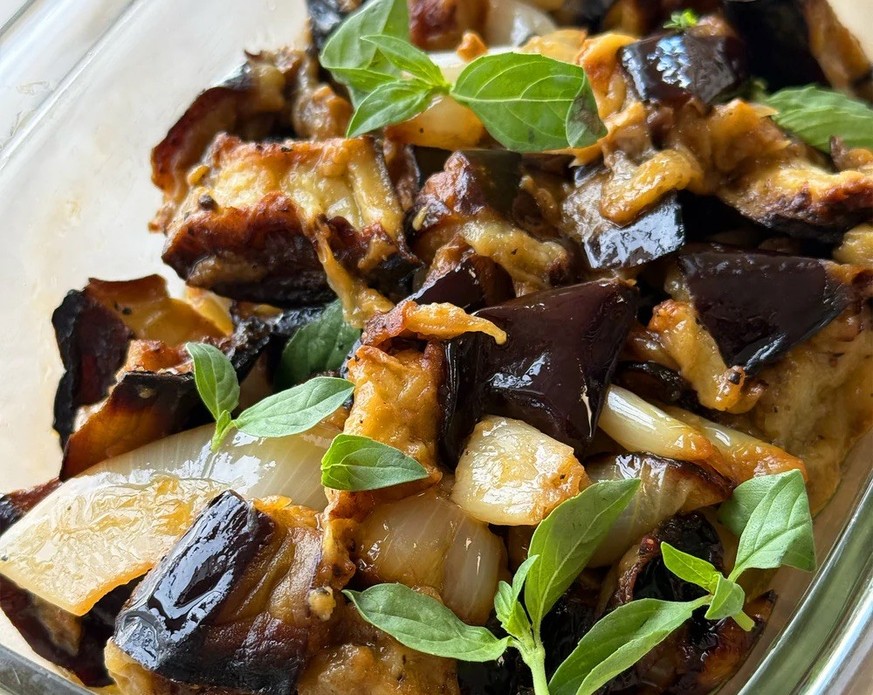 Ottolenghi&#039;s roasted aubergine and onion salad 
https://ottolenghi.co.uk/pages/recipes/roasted-aubergine-onion-salad