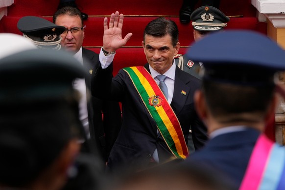 President Rodrigo Paz waves to supporters after his swearing-in ceremony in La Paz, Bolivia, Saturday, Nov. 8, 2025. (AP Photo/Juan Karita)
Bolivia New President