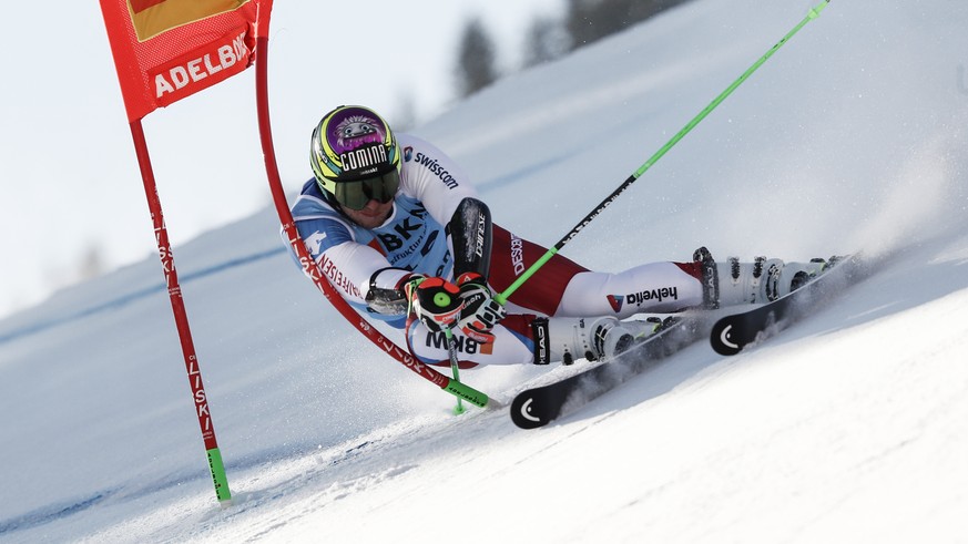 Switzerland&#039;s Justin Murisier speeds down the course during an alpine ski, men&#039;s World Cup giant slalom, in Adelboden, Switzerland, Friday, Jan.8, 2021. (AP Photo/Gabriele Facciotti)