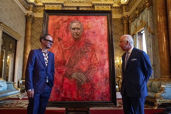 Artist Jonathan Yeo and Britain&#039;s King Charles III at the unveiling of artist Jonathan Yeo&#039;s portrait of the King, in the blue drawing room at Buckingham Palace, in London, Tuesday May 14, 2 ...