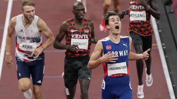 Jakob Ingebrigtsen, of Norway celebrates winning the gold medal in the final of the men&#039;s 1,500-meters at the 2020 Summer Olympics, Saturday, Aug. 7, 2021, in Tokyo, Japan. (AP Photo/Francisco Se ...