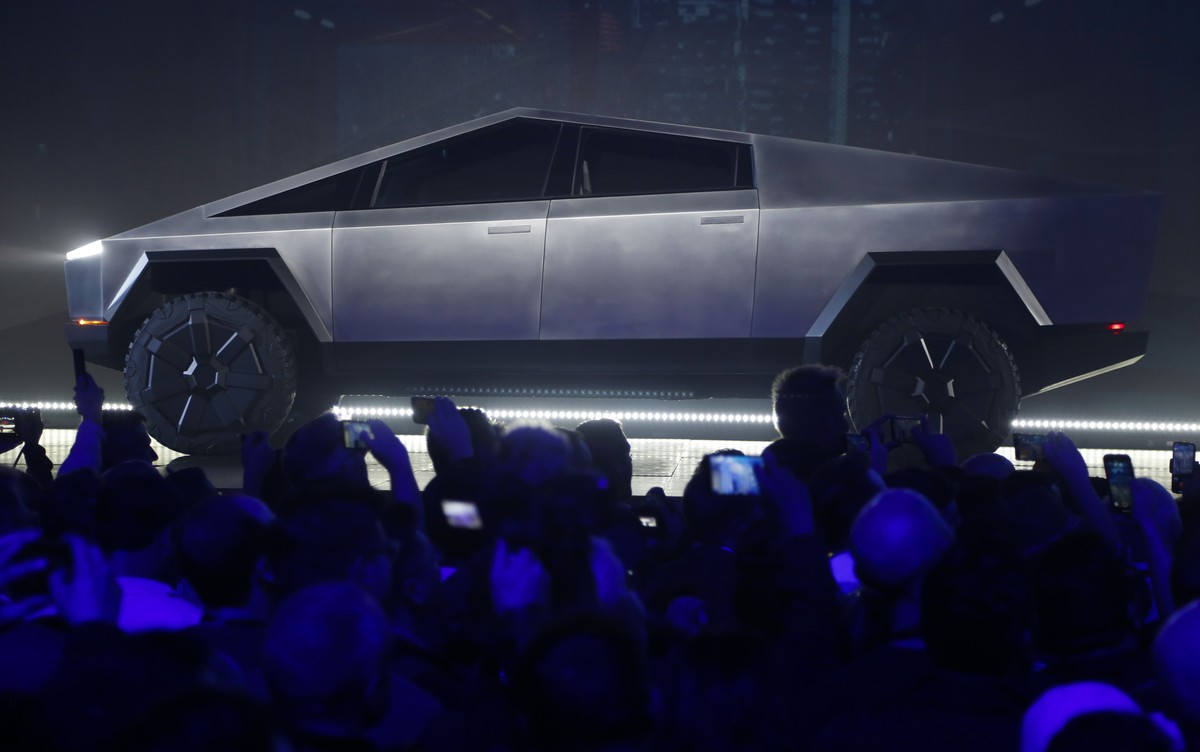 The Tesla Cybertruck is unveiled at Tesla's design studio Thursday, Nov. 21, 2019, in Hawthorne, Calif. CEO Elon Musk is taking on the workhorse heavy pickup truck market with his latest electric ...