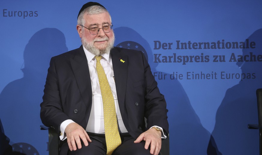 epa11328506 President of the Conference of European Rabbis, Rabbi Pinchas Goldschmidt arrives for the Charlemagne Prize (Karlspreis) award ceremony in the town hall of Aachen, Germany, 09 May 2024. Ra ...