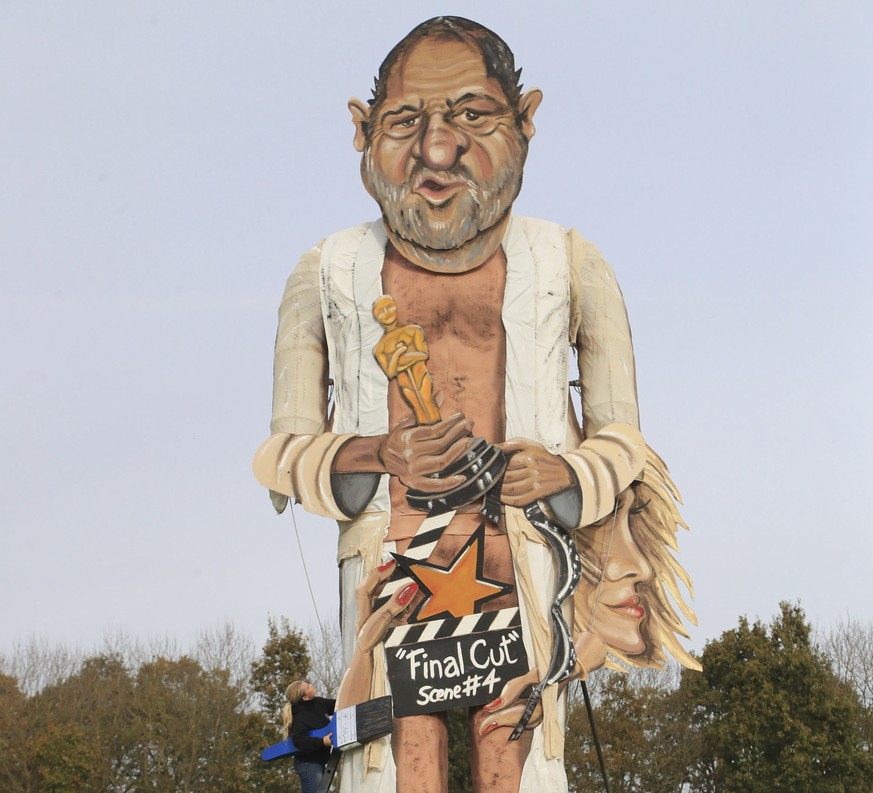 Artists Frank Shepherd and Andrea Deans put the finishing touches to the Edenbridge Bonfire Society effigy, which has been unveiled as Harvey Weinstein, for Bonfire Night in Edenbridge, England, Wedne ...