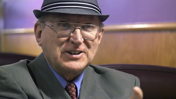 FILE - This Feb. 2, 2018 file photo from a video frame grab shows Arthur Jones, a Holocaust denier and Nazi sympathizer, who got onto November's ballot as a Republican congressional candidate when the state GOP failed to put forward another candidate in the safely Democratic district. Although the GOP condemned Jones, he will still appear on the Nov. 6 ballot as a Republican. Even in 2018, a year being portrayed as the most important midterm race in a generation, races for some of the most important positions in states across the country aren't even contests.  (Marcus DiPaola /Chicago Sun-Times via AP, File)