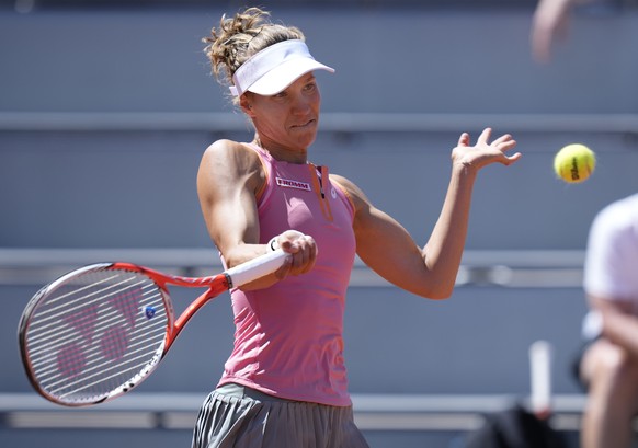 Switzerland&#039;s Viktorija Golubic plays a return to Estonia&#039;s Anett Kontaveit during their first round match on day three of the French Open tennis tournament at Roland Garros in Paris, France ...