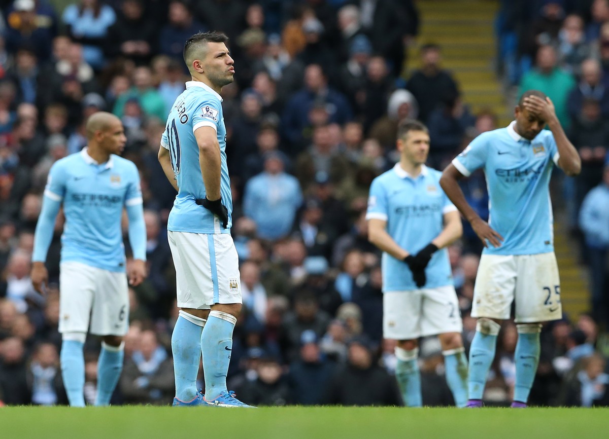 epa08218264 (FILE) - Manchester City's players react after Leicester City's Robert Huth (unseen) scored during the English Premier League soccer match between Manchester City and Leicester C ...