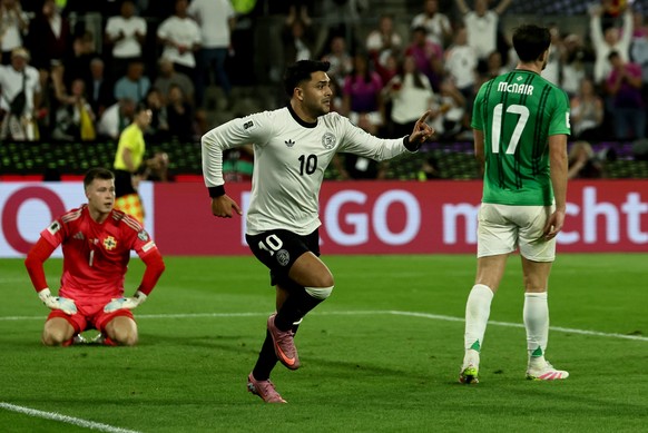 epa12360859 Nadiem Amiri of Germany celebrates after scoring the 2-1 goal during the FIFA World Cup 2026 Group A qualification match between Germany and Northern Ireland in Cologne, Germany, 07 Septem ...