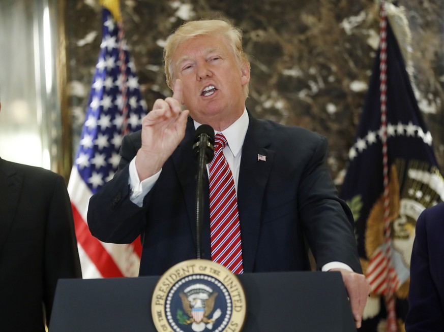 President Donald Trump speaks to the media in the lobby of Trump Tower in New York, Tuesday, Aug. 15, 2017. (AP Photo/Pablo Martinez Monsivais)