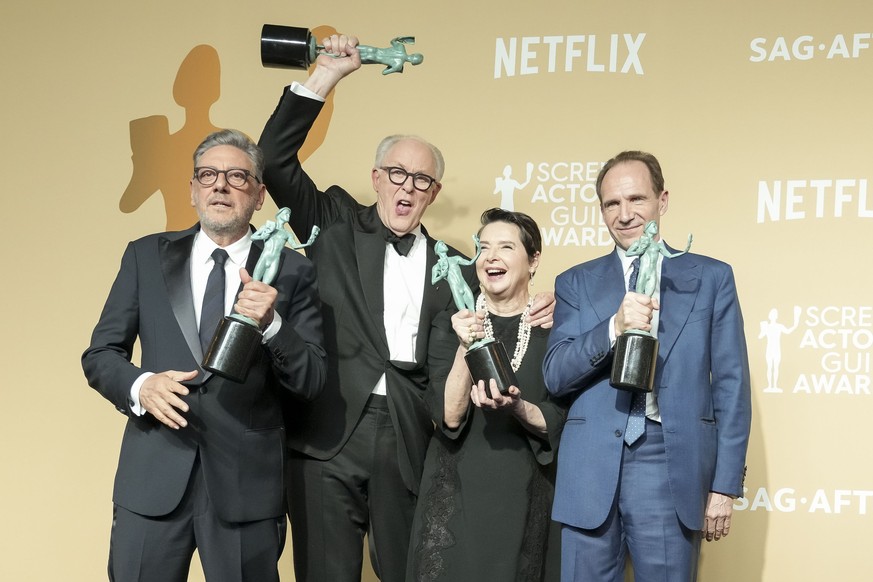 epa11920422 Actors (L-R) Sergio Castellitto, John Lithgow, Isabella Rossellini, and Ralph Fiennes in the press room after the cast from the movie ?Conclave? won the SAG award for ?Outstanding Performa ...