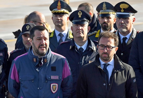 epa07282591 Italian Deputy Prime Minister and Interior Minister Matteo Salvini (L) and Italian Justice Minister Alfonso Bonafede (R) deliver a joint statement after former far-left militant Cesare Bat ...