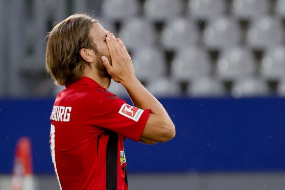 epa08452838 Freiburg&#039;s Lucas Hoeler reacts during the German Bundesliga soccer match between SC Freiburg and Bayer 04 Leverkusen in Freiburg, Germany, 29 May 2020. EPA/RONALD WITTEK / POOL CONDIT ...