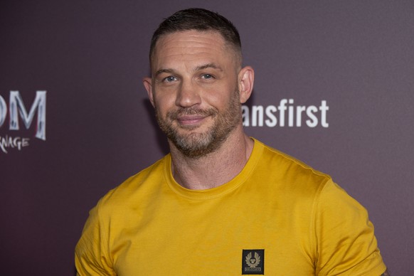Tom Hardy poses for photographers during a photo call for his film Venom: Let There Be Carnage, ahead of a screening at a central London cinema, Tuesday, Sept. 14, 2021. (Photo by Joel C Ryan/Invision ...