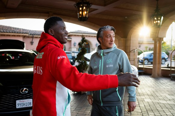 Switzerland's Breel Embolo, left, talks to head coach Murat Yakin, right, after his arrival at the team hotel, Fairmont Grand Del Mar, in San Diego, Friday, June 5, 2026, ahead of the FIFA World  ...