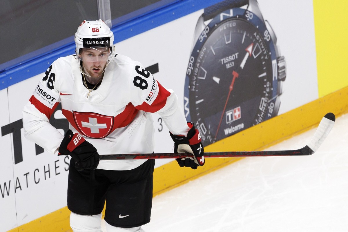 Switzerland's defender Janis Jerome Moser looks his teammate, during the IIHF 2023 World Championship preliminary round group B game between Canada and Switzerland, at the Riga Arena, in Riga, La ...