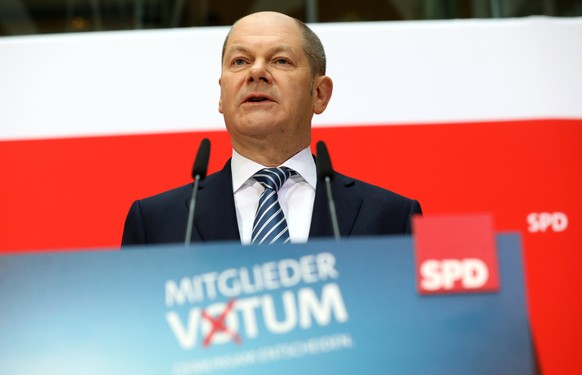 epa06578472 Olaf Scholz, First Mayor of Hamburg and Acting Leader of the Social Democratic Party of Germany (SPD), speaks during a press conference to present the result of the members voting on the c ...