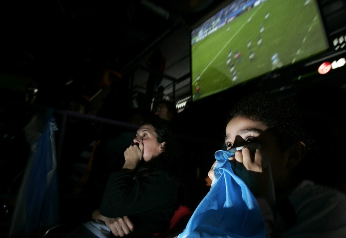 Des supporters, devant un match.
