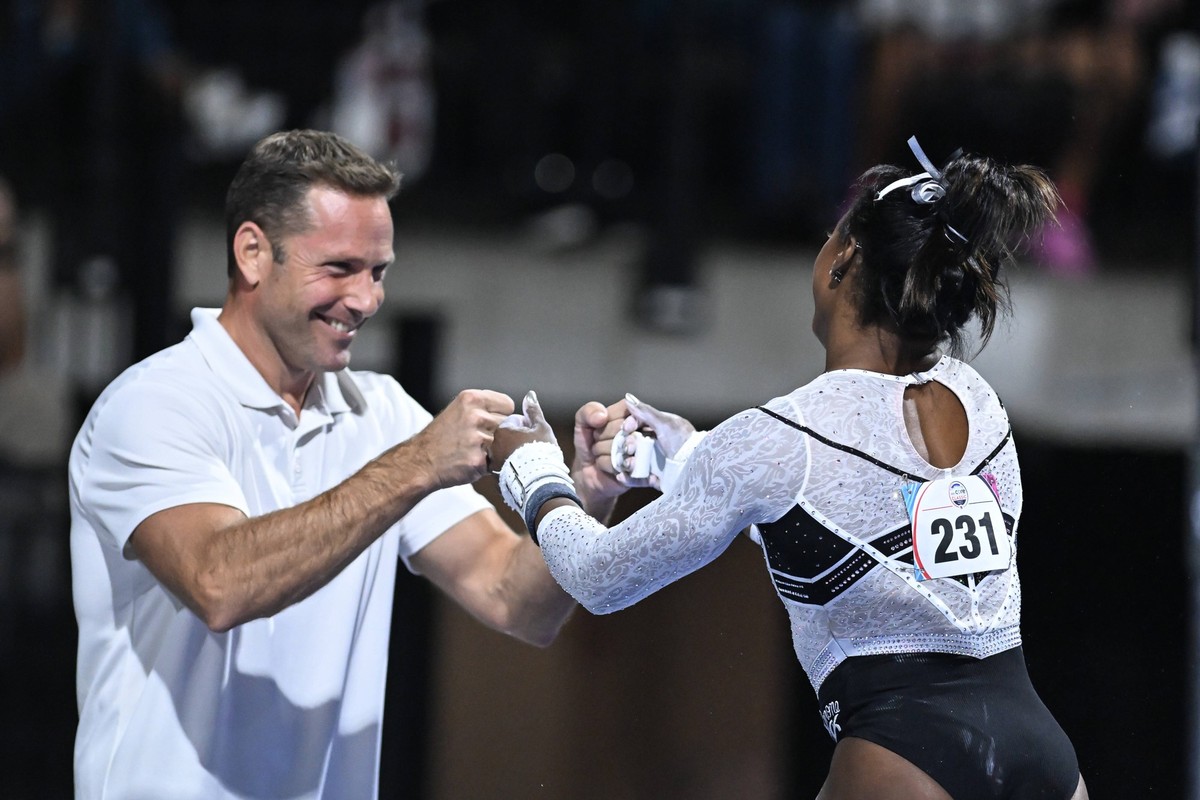 August 5, 2023, Hoffman Estates, Illinois, US: LAURENT LANDI celebrates with SIMONE BILES during the competition held at the NOW Arena in Hoffman Estates, Illinois. Hoffman Estates US - ZUMAs146 20230 ...
