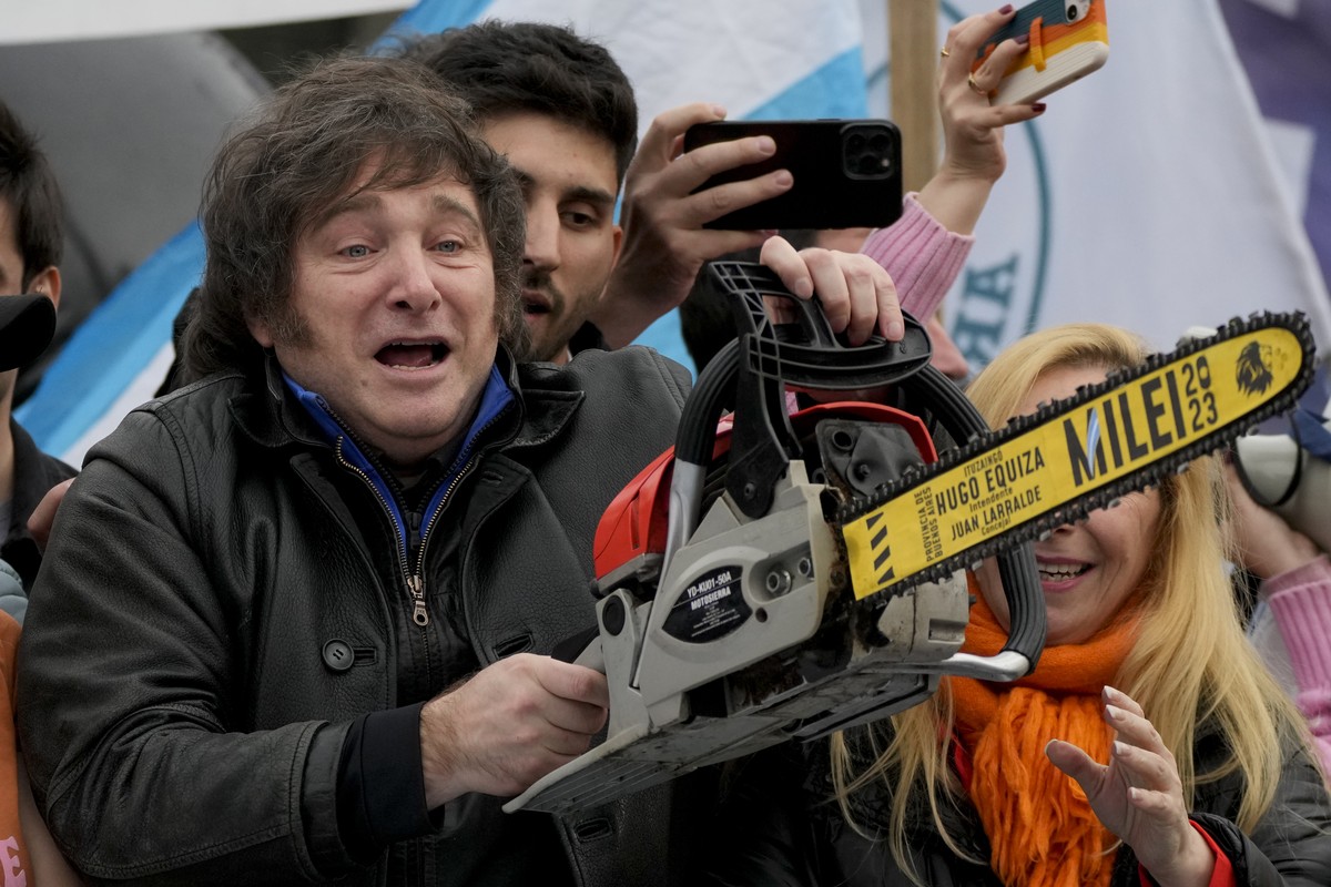 Presidential hopeful of the Liberty Advances coalition Javier Milei brandishes a chainsaw during a campaign event in La Plata, Argentina, Tuesday, Sept. 12, 2023. General elections are set in Argentin ...