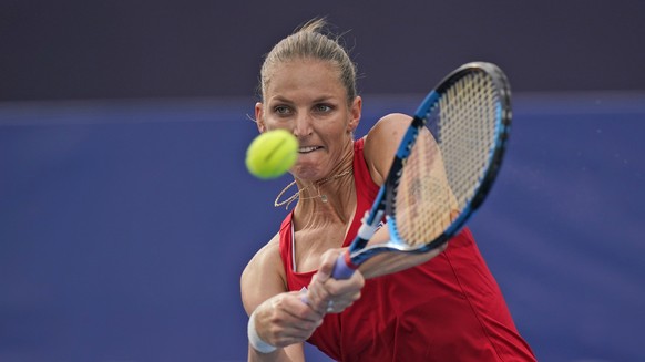 Karolina Pliskova, of the Czech Republic, plays Carla SuÃ¡rez Navarro, of Spain, during the second round of the tennis competition at the 2020 Summer Olympics, Monday, July 26, 2021, in Tokyo, Japan.  ...