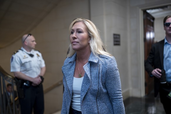 Rep. Marjorie Taylor Greene, R-Ga., arrives as House Republicans hold a closed-door meeting to vote by secret ballot on their candidate for speaker of the House, at the Capitol in Washington, Wednesda ...