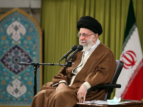 FILE - In this picture released by the official website of the office of the Iranian supreme leader, Supreme Leader Ayatollah Ali Khamenei speaks during a meeting with a group of Basij paramilitary fo ...