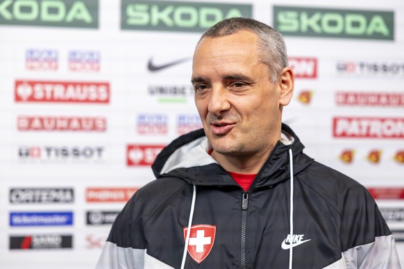 Jan Cadieux Jan, assistant coach of Switzerland national ice hockey team, speaks with media in the mixed zone of the Jyske Bank Boxen after a Switzerland team training session, at the IIHF 2025 World  ...