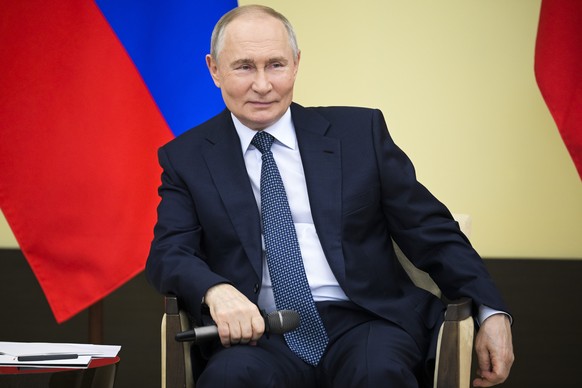Russian President Vladimir Putin attends a meeting with young scientists at Novo-Ogaryovo state residence outside of Moscow, Russia, Monday, Dec. 2, 2024. (Vladimir Astapkovich, Sputnik, Kremlin Pool  ...