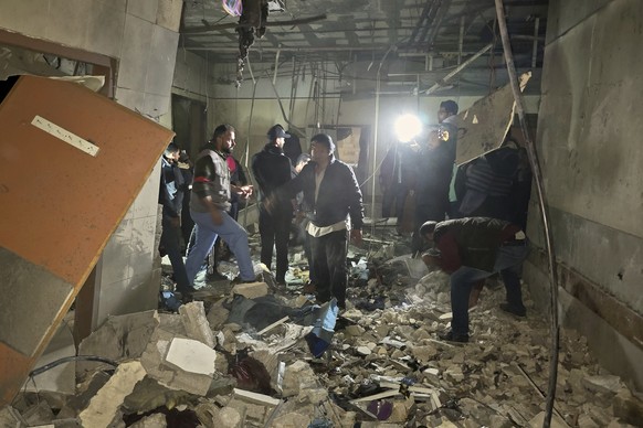 Rescue workers inspect a room at Nasser hospital after it was hit by a targeted Israeli army strike in Khan Younis, southern Gaza Strip, Sunday, March 23, 2025. (AP Photo/Mohammad Jahjouh)
Israel Pale ...