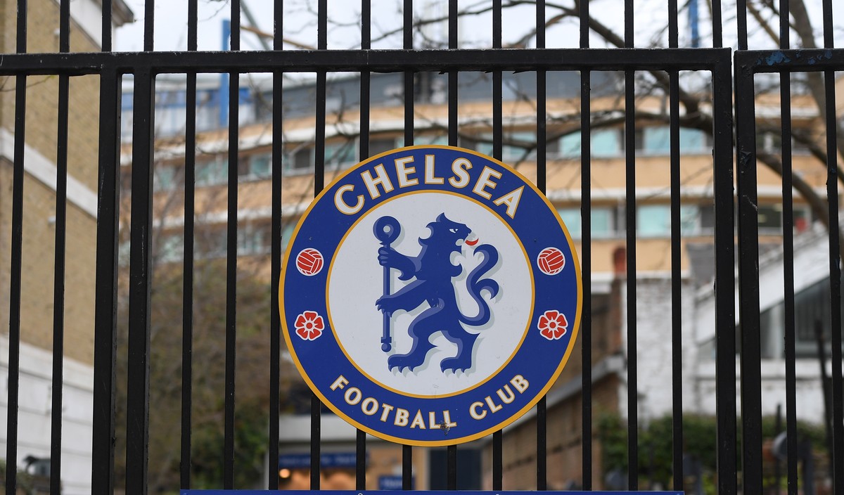 epa09871860 Chelsea FC's logo on a fence at Stamford Bridge stadium in London, Britain, 05 April 2022. The owners of the baseball team Chicago Cubs, the Ricketts family have stated they will star ...