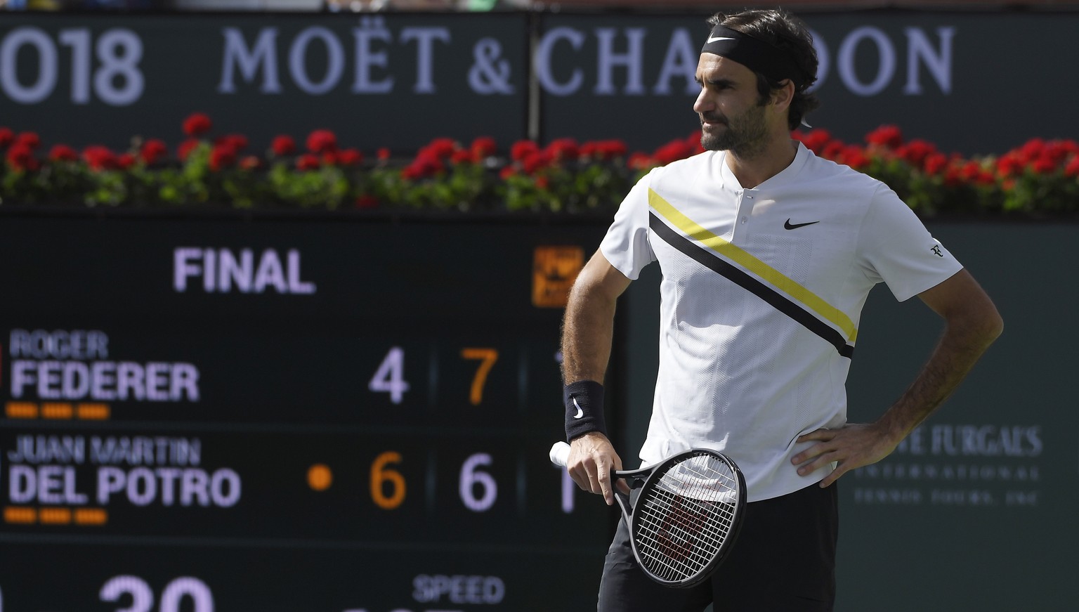 Roger Federer, of Switzerland, stands on the court after losing a point to to Juan Martin del Potro, of Argentina, during the men&#039;s final at the BNP Paribas Open tennis tournament, Sunday, March  ...