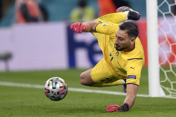 Italy&#039;s goalkeeper Gianluigi Donnarumma saves a shootout penalty during the Euro 2020 soccer semifinal match between Italy and Spain at Wembley stadium in London, Tuesday, July 6, 2021. Italy won ...