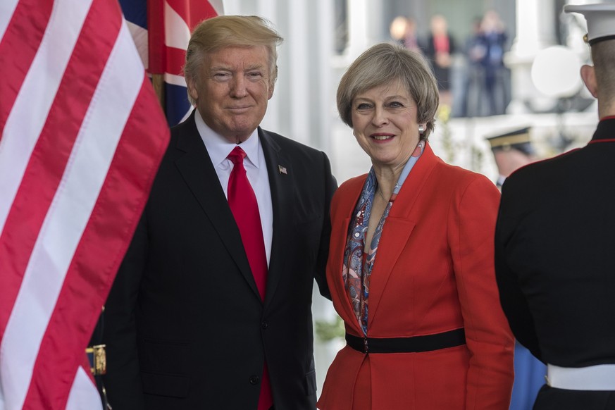 epa05755221 US President Donald J. Trump greets British Prime Minister Theresa May as she arrives at the White House in Washington, DC, USA, 27 January 2017. Prime Minister May is the first foreign he ...