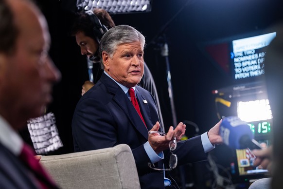 epa11597477 Conservative talk show host Sean Hannity speaks to members of the media ahead of the presidential debate between former US President Donald Trump and current Vice President Kamala Harris i ...