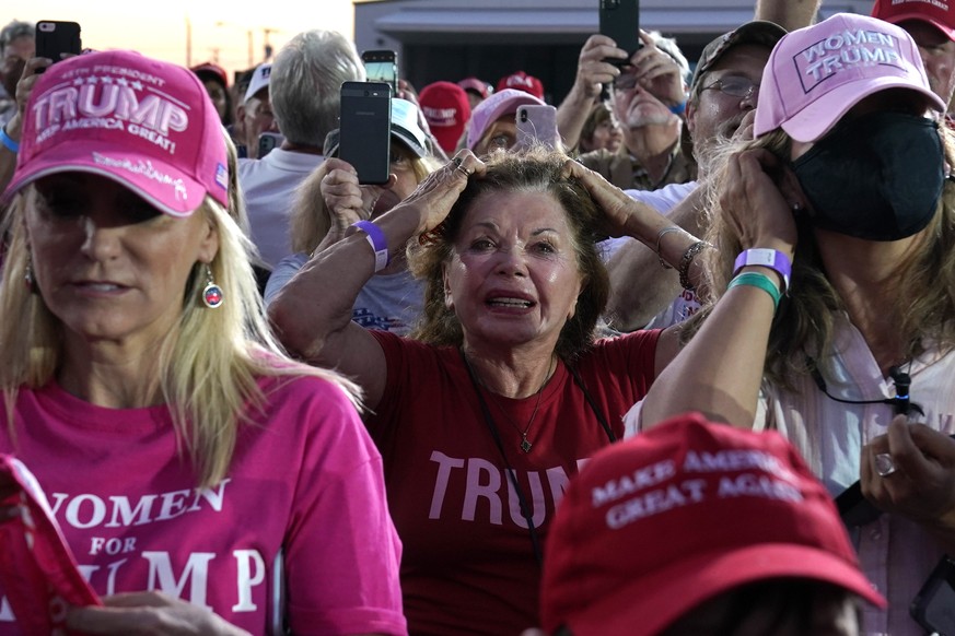 Supporters watch as President Donald Trump speaks during a campaign rally at Orlando Sanford International Airport, Monday, Oct. 12, 2020, in Sanford, Fla. (AP Photo/Evan Vucci)
Donald Trump