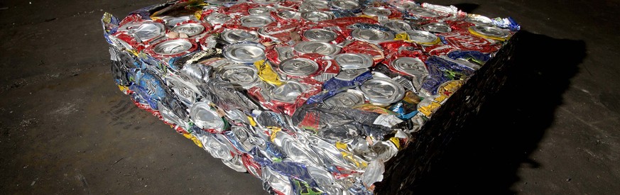 A compressed block of aluminium cans is pictured at a metal recycling facility in Sydney, February 18, 2014. Aluminium producer Alcoa Inc said it will close its Point Henry smelter and two rolling mil ...