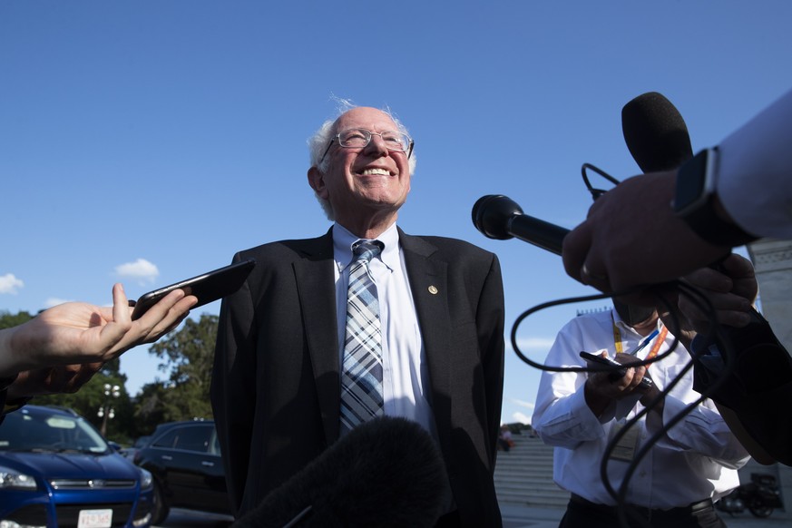 epaselect epa09341206 Independent Senator from Vermont Bernie Sanders speaks to members of the news media regarding his meeting at the White House with US President Joe Biden, after arriving on Capito ...