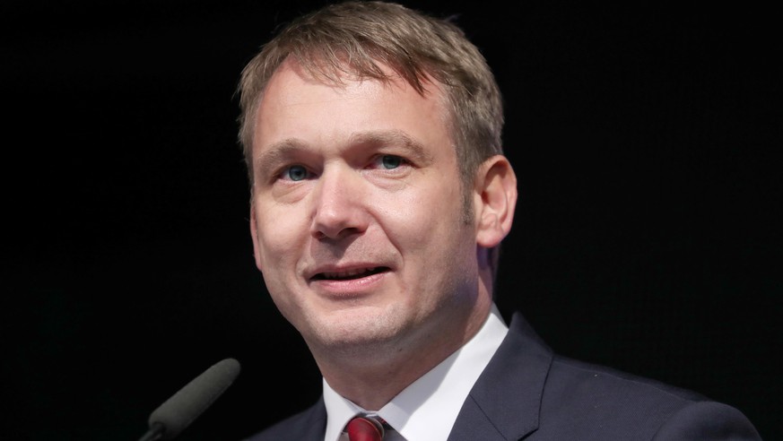 epa06200473 Andre Poggenburg, chairman of 'Alternative for Germany' party (AfD) in the federal state of Saxony-Anhalt speaks during a demonstration of 'Alternative for Germany' par ...